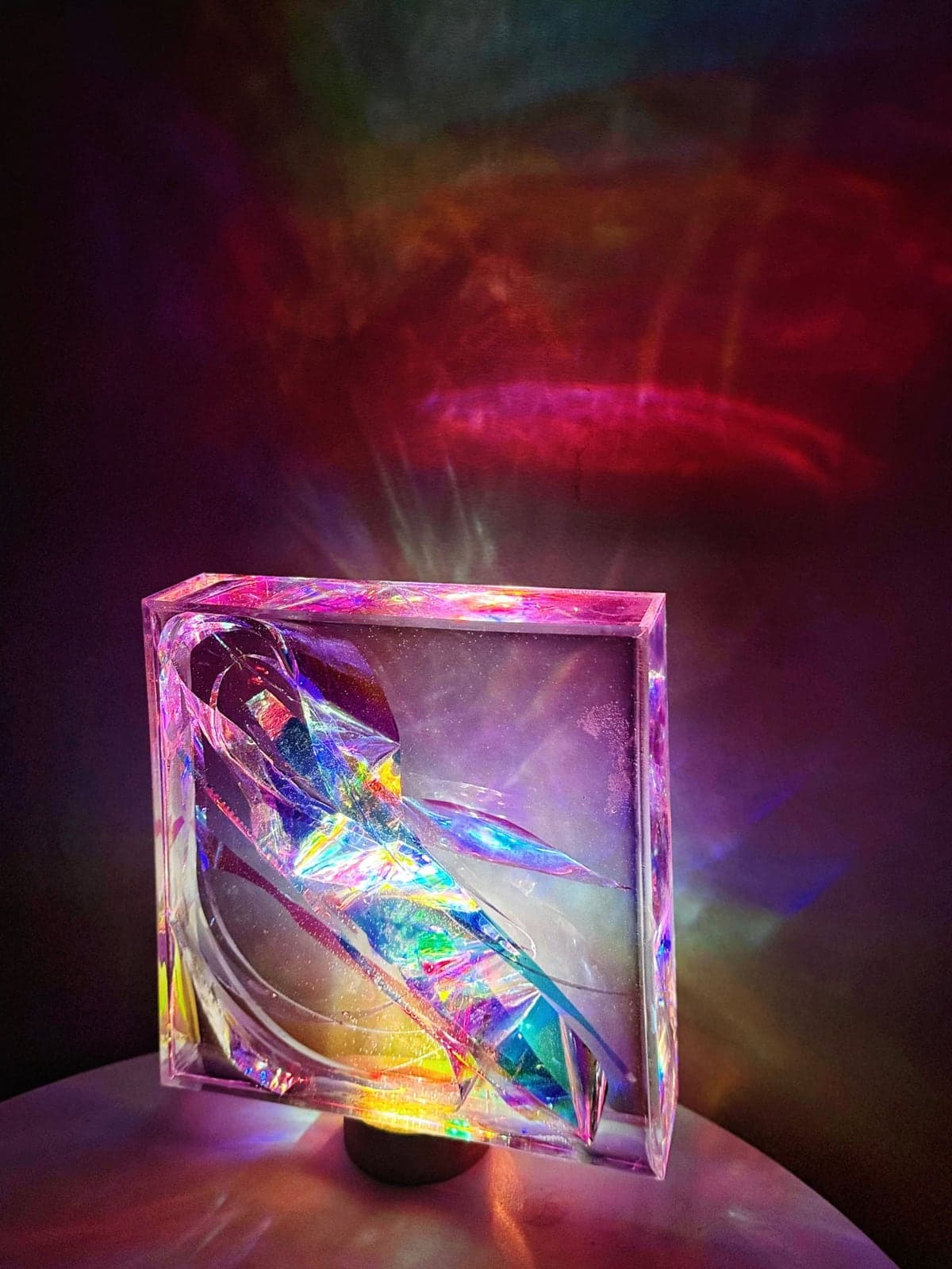 Prisma I by Anny Schäfer, 2026, resin, optical elements and light, 20 × 20 × 5 cm